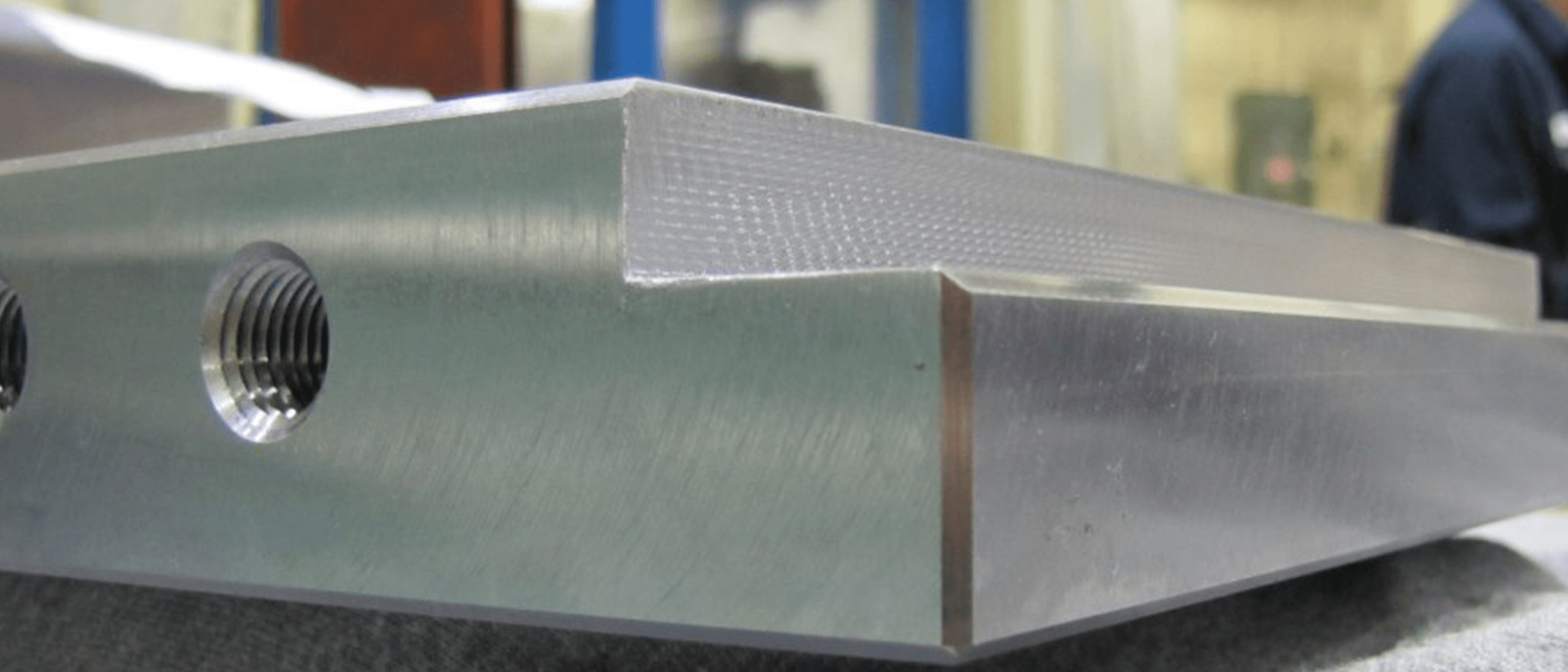Machined steel plate, focused on chamfers on edges